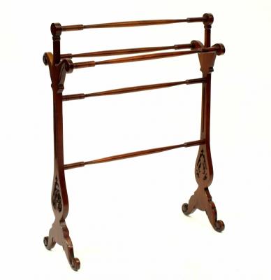 An Edwardian-style stained wood towel rail with pierced decoration, on outswept legs, width 73cm, height 92cm and a matching marble-topped bedside table on reeded tapering legs.