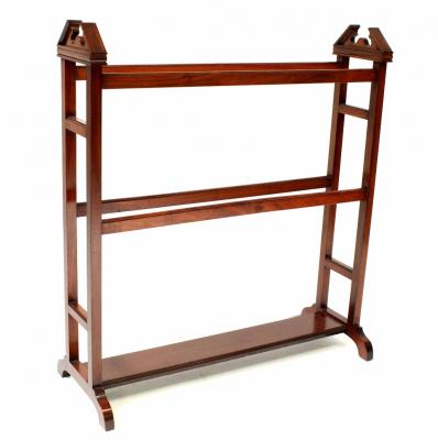 An Edwardian mahogany towel rail on square supports, width 80cm, height 90cm.