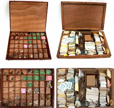 Various pocket watch parts, two wooden storage boxes with multi-sectioned interiors containing balance wheels, springs, various sizes, a large quantity of watch crystal packets with corresponding numbers top right (2).