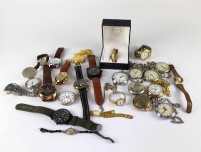 A collection of wristwatches and reproduction open face pocket watches, mostly with Albert chains.