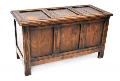A late 18th/early 19th century oak blanket box, three panels to the top over three lower panels, 51 x 89cm.
