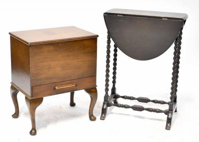 A 1940s oak rectangular topped sewing box with lift-up lid and single drawer, on cabriole legs, width 56 x 45.5 x 32cm and an ebonised dropleaf side table on barleytwist supports and outswept feet, when closed 69 x 51 x 21cm (2).