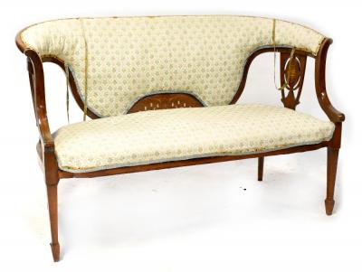 An Edwardian inlaid mahogany bowed two-seater settee with upholstered back and pierced vase splats, on an overstuffed seat with square tapering legs and spade feet, height 84cm, length 129cm
