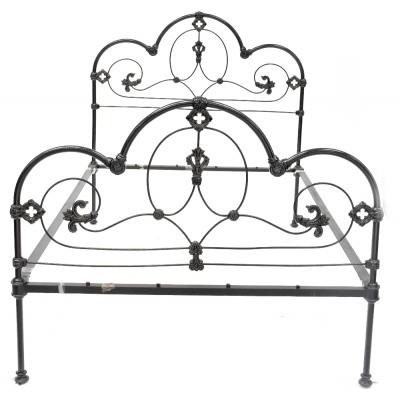 A Victorian-style gilt heightened black painted wrought iron double bedstead, 137 x 137 x 196cm (af).