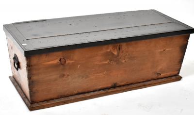 A 19th century blanket box with painted plank top and iron drop handles, on a plinth base, 41 x 120 x 50cm.