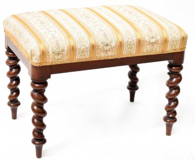 A Victorian mahogany upholstered stool with overstuffed seat, on barleytwist supports, 43 x 60 x 40cm.