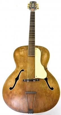 A Jacques F hole acoustic guitar, of Favino type, length 104cm, with an associated soft cover case.