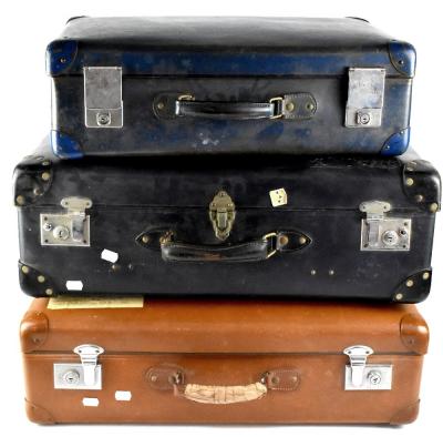 Two vintage card suitcases, one navy, one tan, with old paper travel label 'Samanda World Travel', length of each 66cm (2).