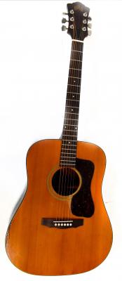 A late 1960s all original Guild acoustic six string acoustic guitar, paper label to the interior, model D35NT, serial no.203111, 'Made in the USA', serial no. impressed to top of neck 203111, length 105cm, in soft carrying case.