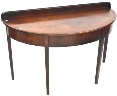 A 19th century mahogany demi-lune table, raised back rail to four tapering block supports, 77.5 x 102.5 x 102.5cm.