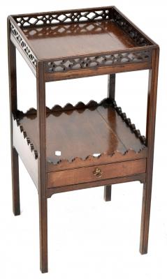 A 19th century mahogany two-tier occasional table with fretwork rim to the top, to slender reeded supports, 73 x 36 x 36cm.