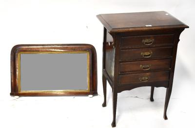 An Edwardian walnut four-drawer music cabinet on tapering cabriole legs, 76 x 56 x 37cm, and a Victorian walnut framed overmantel mirror 46 x 74cm (2).