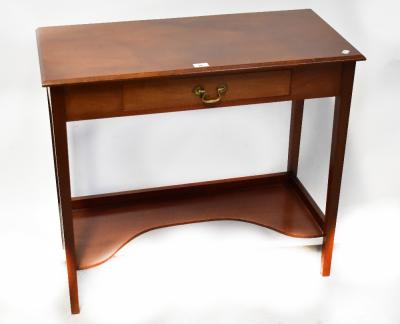 An Edwardian style mahogany rectangular top side table with single frieze drawer, on square tapering legs and shaped undertier, 76 x 86 x 40cm.