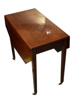 A 19th century and later mahogany Pembroke table with cutlery drawer, the short drop flaps with angle cut corners, raised on square tapering supports with brass caps and castors, the inside of the drawer stamped 'Gillows', height 64.5cm, length 71cm.