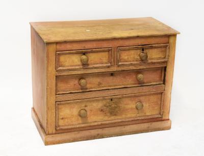 An early 20th century stripped pine chest of two short over two long graduated drawers, on plinth base, 70 x 91 x 46cm (af).