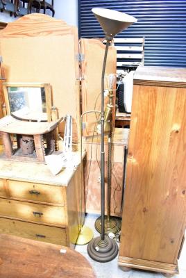 Three metal standard lamps comprising one with a rope twist effect brass column on a circular base, height 127cm, an Anglepoise style example and one other with conical shade (3).