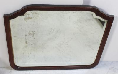 An early-to-mid 20th century mahogany-framed bevel-edged mirror, 60 x 69cm.