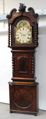 A late 18th century mahogany North Country longcase clock, the rolling moon arched dial set with Roman numerals and subsidiary seconds and date chapter dial, the painted spandrels representing continents of the British Empire, height 264cm (af).