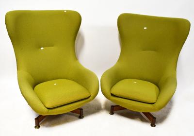 In the style of Arne Jacobsen for Fritz Hansen, a pair of circa 1960s retro fibreglass Egg chairs on crossed teak support and brass feet, each covered in lime green stretch fabric (2).