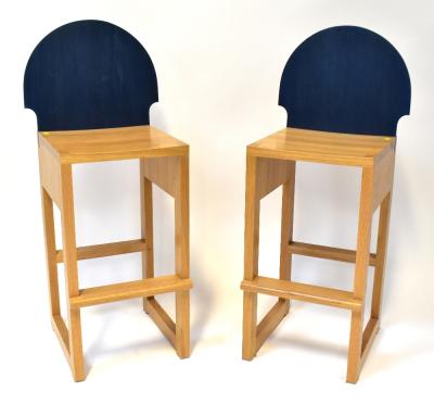 A matched pair of modern bespoke made oak high stools, with jointed tops, foot rest and stained blue plywood back, height 108cm, height to seats 71cm (2).