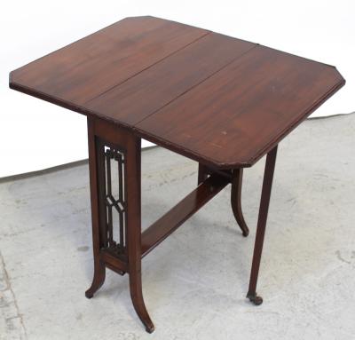A 1930s mahogany Sutherland table with reticulated end panels, on square tapering swept legs, the swing support legs with porcelain castors, width 60cm.
