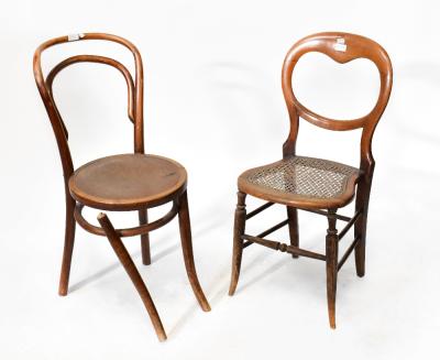 A set of three bentwood chairs with embossed decoration to the seat (af), a pair of bar back cane seated bedroom chairs raised on outswept tapering stretchered supports and a further balloon back cane seated chair (af) (6).