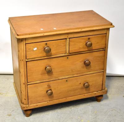 An early 20th century pine chest of two short over two long drawers, raised on turned feet, 82 x 84 x 44cm.