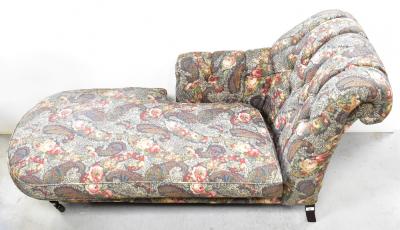 A reproduction Victorian-style chaise longue with button upholstered scrolling arm, upholstered in a Paisley-style floral fabric, approx 84 x 170 x 83cm.