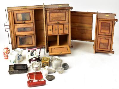 A vintage dolls' house and furniture to include a wooden dresser within metal frame, height 41cm, a wooden kitchen unit in metal frame, height approx 44cm, various dolls' house kitchen items to include plate racks, cookware, pans, etc and some 19th century miscellaneous pottery and porcelain to include a mid-19th century Staffordshire flatback figure of a fruit seller, porcelain fairings, a miniature Satsuma vase, etc.