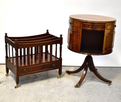 A reproduction mahogany Canterbury with three-section top, single drawer with two brass ring handles, on brass cup castors, height 53cm, length 56cm, together with a mahogany reproduction drum centre table, with three small drawers and three faux drawers, with three open compartments and three blank fronts, on a swivel base raised on four splayed feet, with brass paw end caps on brass castors, height 74cm, diameter 51cm (2).