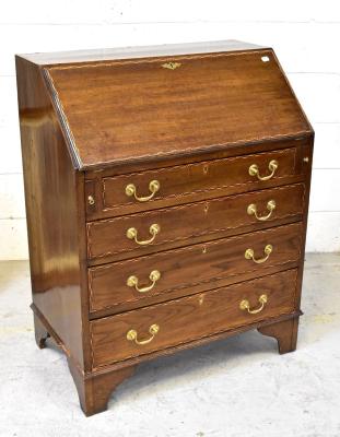 An early 20th century oak bureau with satinwood and ebony inlaid detail to the edges, the fall front enclosing a simple fitted interior, above a base of four long drawers to bracket feet, 98 x 76 x 46cm.