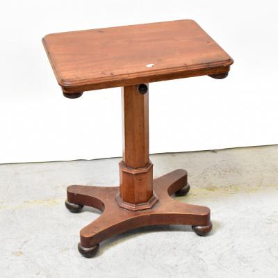 A Victorian walnut rectangular adjustable lectern, with hinged top and fold-out sections, raised on octagonal tapering column to quadripartite base and turned feet, 72 x 57 x 41cm.