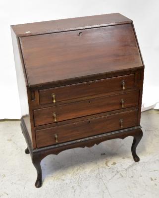 An early 20th century walnut fall front bureau with an assortment of pigeon holes and single drawer to the interior, above three drawers and raised on cabriole legs to pad feet, 100 x 74 x 43cm.
