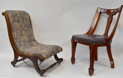 A set of four Victorian mahogany framed dining chairs with stuff-over seats, raised on square tapering front legs to spade feet, also a walnut framed low nursing chair raised on stretchered outswept supports to castors (5).