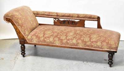 A Victorian harlequin three-piece parlour suite comprising chaise longue and pair of chairs, all upholstered in floral fabric (3).