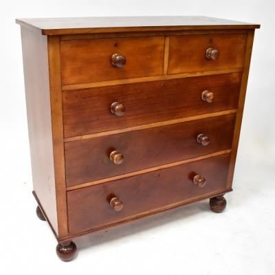 A Victorian mahogany chest of two short and three long drawers, raised on bun feet, 105 x 104 x 50cm.