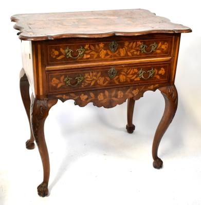 A c1840 mahogany Dutch marquetry side table, with shaped top inset with vase of flowers within floral border and scrolls, with butterflies to each corner, over two long drawers inset with marquetry floral design, brass handles over marquetry inset shaped apron, on cabriole legs, acanthus leaves to the knees, to ball and claw feet, 79 x 74 x 51cm.  Provenance: From the descendants of Andrew Barclay Walker (of Walker Gallery Liverpool), this item has been passed down the generations and is suggest