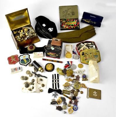 Various items of militaria to include cap badges, buttons, caps, belt buckles, embroidered badges, cigarette cards, medal ribbons, Iron Cross, etc.