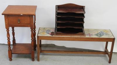 An early 20th century mahogany square side table, one frieze drawer with lower shelf to turned supports, an Edwardian mahogany four-tier letter rack, a pair of vintage oak bookends in the form of horses' heads, a bookslide and a contemporary teak stool with tapestry top, length 105cm (5).