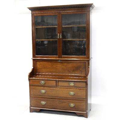 An Edward VII walnut elevated bureau à abattant, the twin glazed bookcase section surmounting a stationery well and three-drawer base on bracket feet, height 208.5cm.