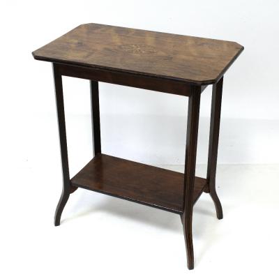 An Edwardian rosewood rectangular side table with floral paterae and line inlay, supported on shaped square tapering legs united by a shelf stretcher, height approx 69cm.