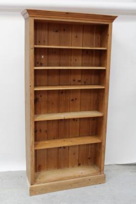 A modern pine plank back floor-standing open bookcase with adjustable shelves, height 198cm.