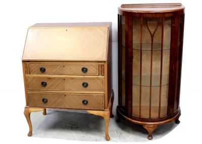 A 1930s walnut demi-lune display cabinet fitted with glass shelves and supported on three cabriole legs, height approx 120cm and a mid-20th century sapele mahogany bureau with pigeonhole interior on mechanical lopers over a three-drawer base on cabriole legs, height 102.5cm (2).