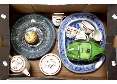 A mixed lot of ceramics to include a chrome green Sadler sports car teapot, a mid-20th century demitasse part coffee set comprising four cups, six saucers, sugar bowl and coffee pot, a Burleigh ware acorn-shaped cruet, a George VI glass Coronation plate dated 1937, a Willow pattern meat plate and a studio pottery charger.