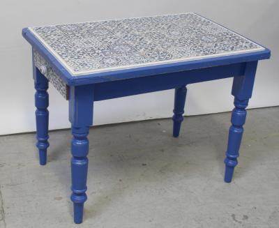 A modernised blue painted Victorian pine kitchen table with tiled top and tiled drawer fronts, length approx 96cm.