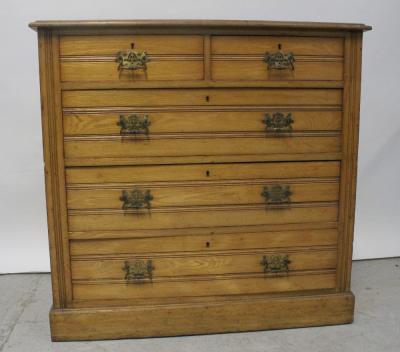 A late Victorian two-over-three drawer ash chest with pierced back plate handles, height 99.5cm.