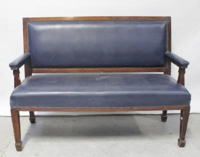A 19th century mahogany-framed settle, originally from a pub, upholstered in royal blue faux leather fabric, to tapering supports and peg feet, length 135cm.