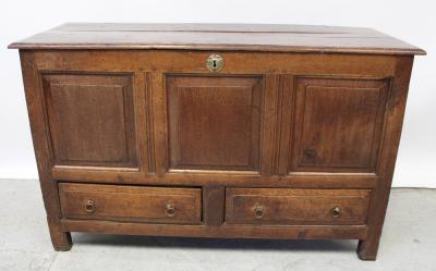 A 19th century oak two drawer mule chest with three fielded panel front, width approx 130cm.