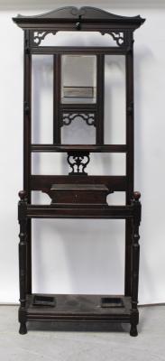 A late Victorian oak hall stand with rectangular bevel glass mirror, hinged glove box and stick stands with drip trays, height 197cm.