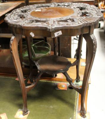 An early 20th century mahogany occasional table in the Oriental style and a mahogany demi-lune hall table (2).